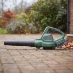 Gustwind leaf blower in full side profile showing the nozzle and battery