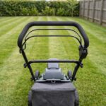 Meridian self-propelled mower seen from behind, looking down the mowing stripes
