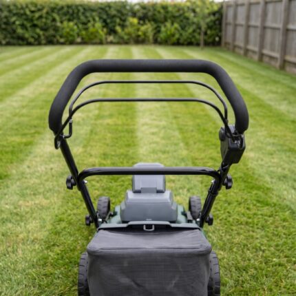 Meridian self-propelled mower seen from behind, looking down the mowing stripes